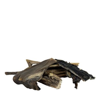 Petsnack ohne Haare Nahaufnahme – natürlicher Kauartikel Hund getrocknetes Leder Detail
